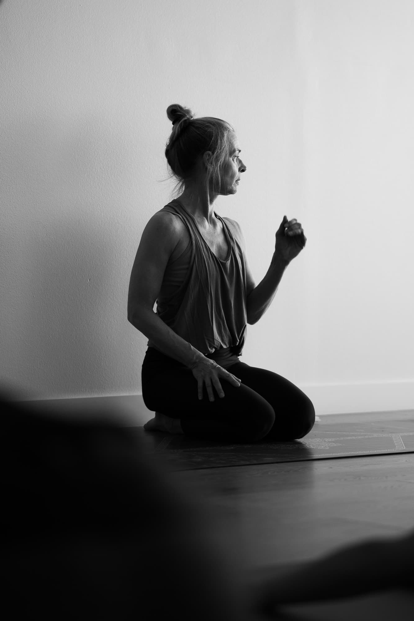Lotta seated in quiet meditation